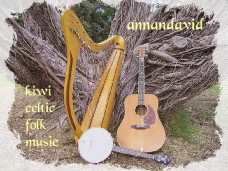 Harp, Guitar & Banjo against Bush setting.